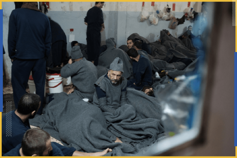 Prisoners suspected of being part of the Islamic State, lie inside a prison cell in Hasaka, Syria, January 7, 2020. REUTERS/Goran Tomasevic SEARCH "ISLAMIC STATE PRISONERS" FOR THIS STORY. SEARCH "WIDER IMAGE" FOR ALL STORIES.