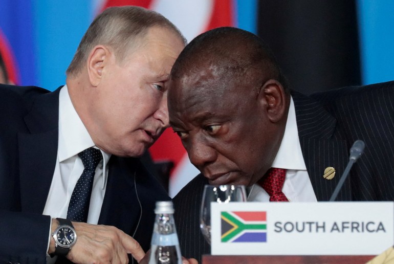 FILE PHOTO: Russia's President Vladimir Putin speaks with South African President Cyril Ramaphosa at the first plenary session as part of the 2019 Russia-Africa Summit at the Sirius Park of Science and Art in Sochi, Russia, October 24, 2019. Sergei Chirikov/Pool via REUTERS/File Photo