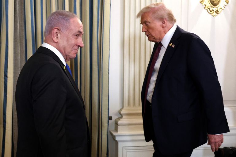 (FILES) US President Donald Trump (R) and Israeli Prime Minister Benjamin Netanyahu leave at the end of a joint news conference in the State Dining Room at the White House on September 29, 2025 in Washington, DC.