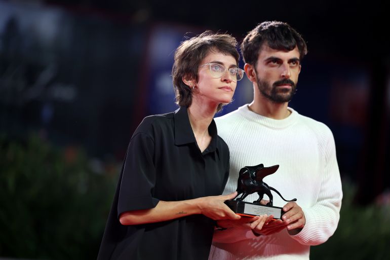 VENICE, ITALY - SEPTEMBER 12: Rachel Szor and Yuval Abraham pose with the Special Jury Prize Award for "Naza" at the Winners Photocall during the 83rd Venice International Film Festival at Sala Grande on September 12, 2026 in Venice, Italy. (Photo by Elisabetta A. Villa/Getty Images)