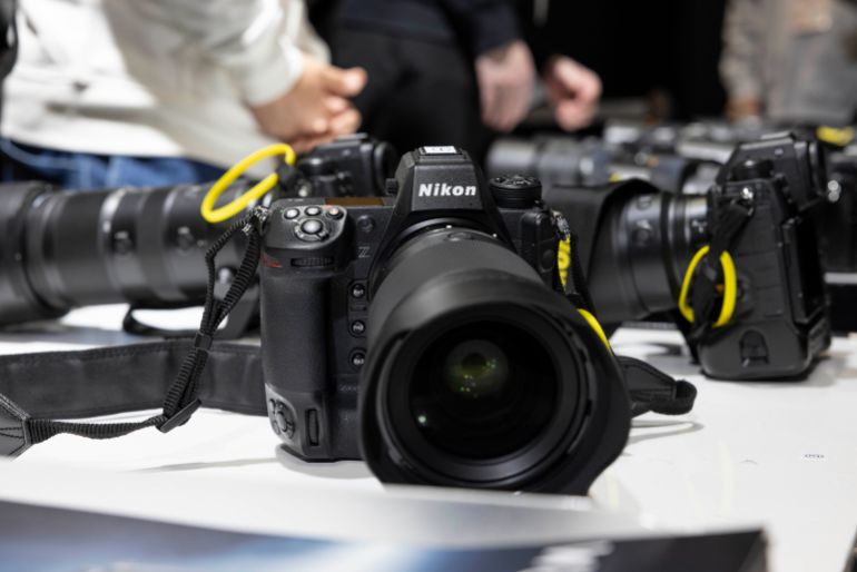 YOKOHAMA, KANAGAWA, JAPAN - 2025/02/27: Nikon camera prepared for visitors inside the Nikon exhibition area at CP+ 2025 in Pacifico Yokohama. CP+ (Camera & Photo Imaging Show) is an international photography and imaging trade show held annually in Yokohama, Japan, at the Pacifico Yokohama convention center. It is one of the world's largest events dedicated to cameras, photography, and imaging technology, organized by the Camera & Imaging Products Association (CIPA). The show serves as a platform for leading camera manufacturers, lens makers, and imaging-related companiessuch as Canon, Nikon, Sony, Fujifilm, Panasonic, Sigma, and Tamronto showcase their latest products, technologies, and innovations. (Photo by Stanislav Kogiku/SOPA Images/LightRocket via Getty Images)