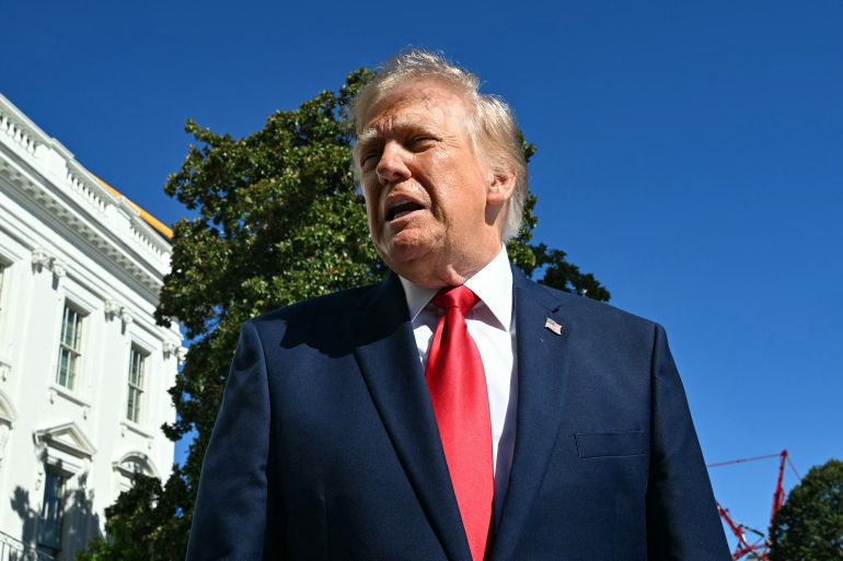US President Donald Trump speaks to the press before walking to board Marine One on the South Lawn of the White House in Washington, DC, on October 7, 2026.