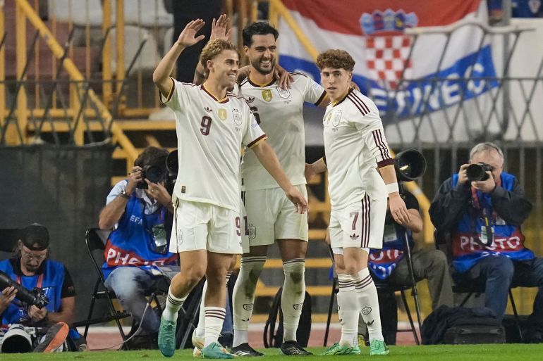Spain's Mikel Merino, center, celebrates scoring his side's 2nd goal during a Nations League soccer match between Croatia and Spain in Split, Croatia, Tuesday, Oct. 6, 2026. (AP Photo/Darko Bandic)