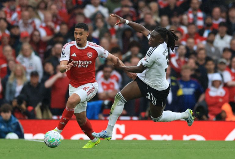 Soccer Football - Premier League - Arsenal v Fulham - Emirates Stadium, London, Britain - May 2, 2026 Fulham's Calvin Bassey in action with Arsenal's William Saliba Action Images via Reuters/Paul Childs